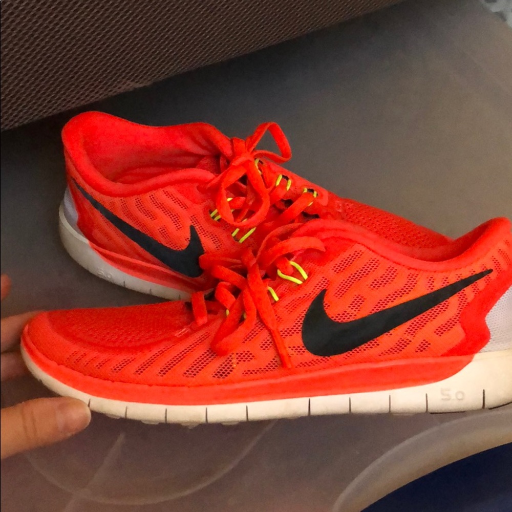 Youth size 3.5 neon orange NIKE free 5.0